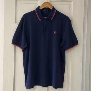 Fred Perry sz L Navy Blue polo with coral and teal stripe trim